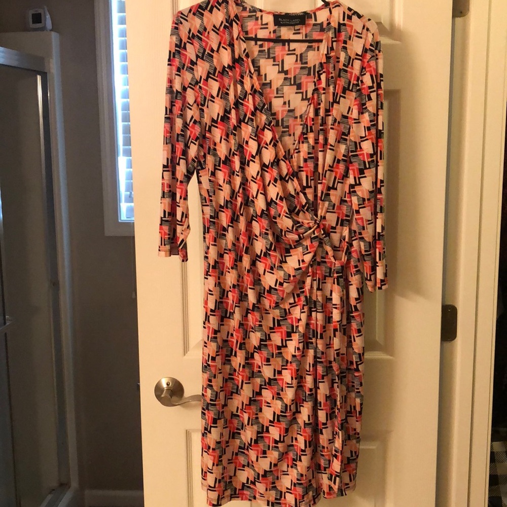 Pink and black pattern wrap dress.